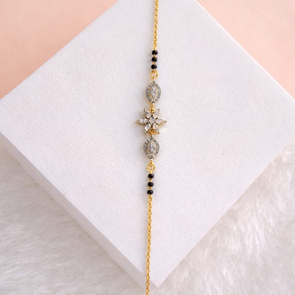 Gold-Plated Crystal Star Bracelet with Black Beads